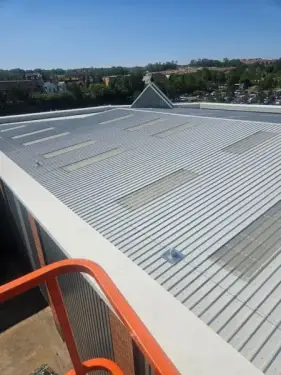 Click Here To Enlarge This Photo Of Roof Refurbishment - Brett Martin Mansafe Non Fragile GRP&comma; Giromax Roof Coat & Euroclad Reverse Profile Cladding