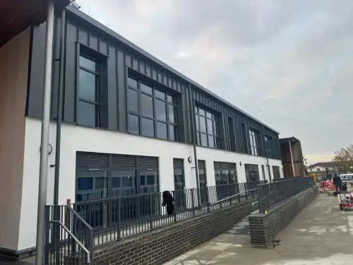 Click Here To Enlarge This Photo Of Ash & Lacy Ashzip 400mm flat pan built up aluminium Standing Seam Roofing & Cladding System in Slate Grey for a private school in London