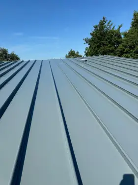 Click Here To Enlarge This Photo Of Ash & Lacy Ashzip 400mm flat pan built up aluminium Standing Seam Roofing & Cladding System in Slate Grey for a private school in London