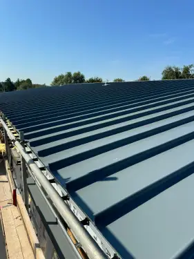 Click Here To Enlarge This Photo Of Ash & Lacy Ashzip 400mm flat pan built up aluminium Standing Seam Roofing & Cladding System in Slate Grey for a private school in London