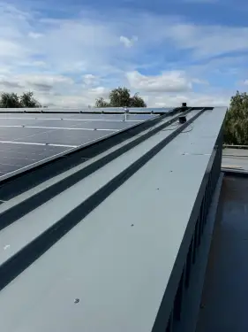 Click Here To Enlarge This Photo Of Ash & Lacy Ashzip 400mm flat pan built up aluminium Standing Seam Roofing & Cladding System in Slate Grey for a private school in London